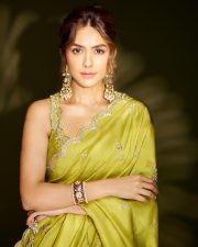 Gorgeous Mrunal Thakur in a Lime Green Silk Saree with a Sleeveless Cropped Blouse Pictures 02