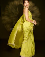 Gorgeous Mrunal Thakur in a Lime Green Silk Saree with a Sleeveless Cropped Blouse Pictures 03