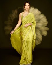 Gorgeous Mrunal Thakur in a Lime Green Silk Saree with a Sleeveless Cropped Blouse Pictures 08