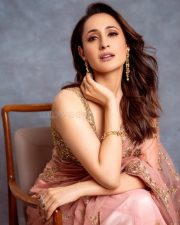 Gorgeous Pragya Jaiswal in a Peach Saree at Daaku Maharaaj Success Press Meet in Hyderabad Photos 03
