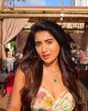 Gorgeous Rashi Singh in a Light Floral Printed Sleeveless Mini Dress Photos 04