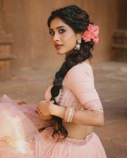 Graceful Actress Nabha Natesh in a blush pink and gold beaded saree blouse crop top with flowing pallu photos 12