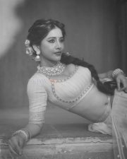 Graceful Actress Nabha Natesh in a blush pink and gold beaded saree blouse crop top with flowing pallu photos 13