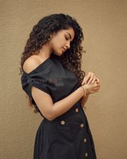 Graceful Anupama Parameswaran in a Black One Shoulder Top with a Safari Skirt Pictures 05