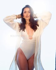 Graceful and Charming Pragya Jaiswal in a White One Piece Swimsuit Bikini Pictures 04