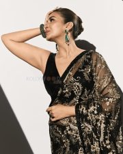 Gulabi Actress Huma Qureshi in a Black Floral Embroidered Saree with a Matching Sleeveless Blouse Photos 01