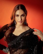 Gulabi Actress Huma Qureshi in a Black Shimmering Georgette Saree with a Matching Full Sleeved Blouse Pictures 01
