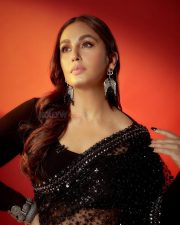 Gulabi Actress Huma Qureshi in a Black Shimmering Georgette Saree with a Matching Full Sleeved Blouse Pictures 03