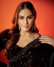 Gulabi Actress Huma Qureshi in a Black Shimmering Georgette Saree with a Matching Full Sleeved Blouse Pictures 04