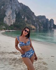 Hot Kavya Thapar in a Blue Floral Beach Bikini Photos 02