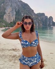 Hot Kavya Thapar in a Blue Floral Beach Bikini Photos 03