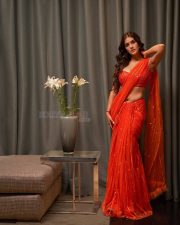 Hot Kavya Thapar in a Red Saree with a Matching Red Blouse Photos 03