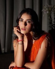 Hot and Curvy Kavya Thapar Cleavage and Navel in an Orange Saree with a Deep Neck Blouse Photos 01