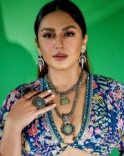 Huma Qureshi Showing Cleavage in a Flowery Top Photo 01