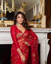 Luminous Shriya Saran Cleavage in a Red organza saree with gold botanical embroidery and V neck long sleeve blouse Photos 03 Luminous Shriya Saran Cleavage in a Red organza saree with gold botanical embroidery and V neck long sleeve blouse Photos 03