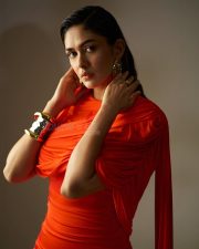 Made in Heaven 2 Actress Mrunal Thakur in an Amber Orange Ruched Dress Stills 01