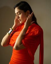 Made in Heaven 2 Actress Mrunal Thakur in an Amber Orange Ruched Dress Stills 02