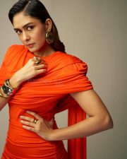 Made in Heaven 2 Actress Mrunal Thakur in an Amber Orange Ruched Dress Stills 03