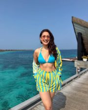 Main Chala Actress Pragya Jaiswal in a Bold Blue and Yellow Striped Shirt and Shorts with a Blue Triangle Bikini Top Pictures 01