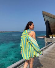 Main Chala Actress Pragya Jaiswal in a Bold Blue and Yellow Striped Shirt and Shorts with a Blue Triangle Bikini Top Pictures 02