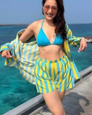 Main Chala Actress Pragya Jaiswal in a Bold Blue and Yellow Striped Shirt and Shorts with a Blue Triangle Bikini Top Pictures 04