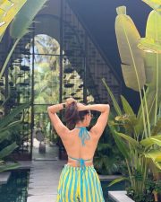 Main Chala Actress Pragya Jaiswal in a Bold Blue and Yellow Striped Shirt and Shorts with a Blue Triangle Bikini Top Pictures 07