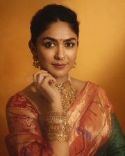 Majestic Actress Mrunal Thakur in a Teal Paithani Silk Saree With Red Border Photos 01
