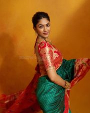 Majestic Actress Mrunal Thakur in a Teal Paithani Silk Saree With Red Border Photos 02