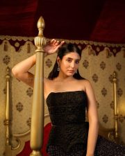 Matka King Actress Kritika Kamra in a Strapless Black Top and Skirt Pictures 03