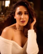 Mesmerizing Actress Pragya Jaiswal in a White Off Shoulder Fuzzy Crop Sweater Photos 07