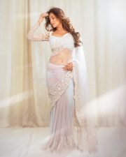 Mesmerizing Actress Rashi Singh in a White Embroidered Lehenga Photos 03
