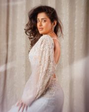 Mesmerizing Actress Rashi Singh in a White Embroidered Lehenga Photos 06