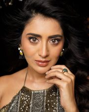 Modern Glam Rashi Singh in a Beaded Fringe Halter Top with an Olive Green Draped Satin Skirt Photos 01