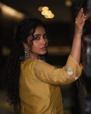 Paradha Actress Anupama Parameswaran in a Mustard Yellow Floral Embroidered Kurta Set Photos 03