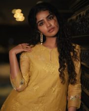 Paradha Actress Anupama Parameswaran in a Mustard Yellow Floral Embroidered Kurta Set Photos 06