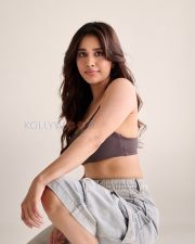 Photogenic Actress Nabha Natesh in a Brown Sports Bra Photos 05