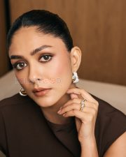 Poised Actress Mrunal Thakur in a brown mock neck asymmetric midi dress Photos 01 Poised Actress Mrunal Thakur in a brown mock neck asymmetric midi dress Photos 01
