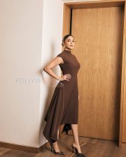 Poised Actress Mrunal Thakur in a brown mock neck asymmetric midi dress Photos 02 Poised Actress Mrunal Thakur in a brown mock neck asymmetric midi dress Photos 02