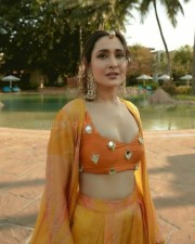 Pragya Jaiswal in an Orange Lehenga with Mirror Blouse Pictures 01