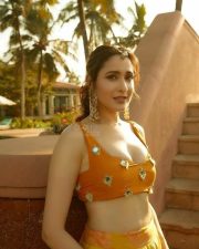 Pragya Jaiswal in an Orange Lehenga with Mirror Blouse Pictures 03
