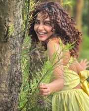 Radiant Actress Anupama Parameswaran in a Yellow Sundress Photos 02