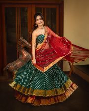 Radiant Actress Nabha Natesh in a Green Red Lehenga Choli Photos 02