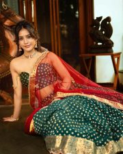 Radiant Actress Nabha Natesh in a Green Red Lehenga Choli Photos 04
