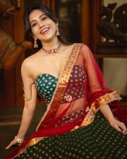 Radiant Actress Nabha Natesh in a Green Red Lehenga Choli Photos 08