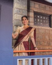 Radiant Nabha Natesh in a Traditional Maroon and Gold Half Saree Photos 04