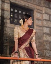 Radiant Nabha Natesh in a Traditional Maroon and Gold Half Saree Photos 06