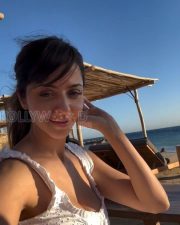 Radiant Vedhika Cleavage in a White Broderie Anglaise Deep V Ruffled Beach Dress Photos 01 Radiant Vedhika Cleavage in a White Broderie Anglaise Deep V Ruffled Beach Dress Photos 01
