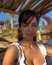 Radiant Vedhika Cleavage in a White Broderie Anglaise Deep V Ruffled Beach Dress Photos 03 Radiant Vedhika Cleavage in a White Broderie Anglaise Deep V Ruffled Beach Dress Photos 03