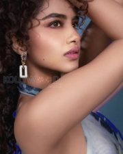 Ravishing Anupama Parameswaran in a Blue Halter Neck Sleeveless Bodycon Dress Pictures 03