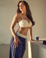 Sassy Nabha Natesh in a Trendy Tracks and White Sports Bra Pictures 04